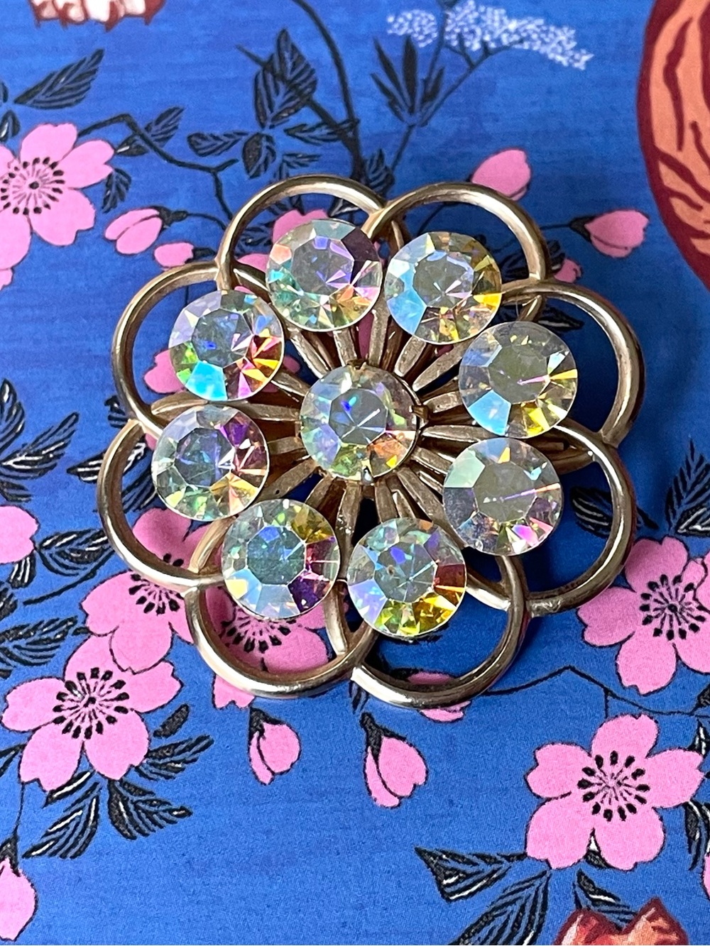 Vintage goldtone & AB rhinestone open flower brooch